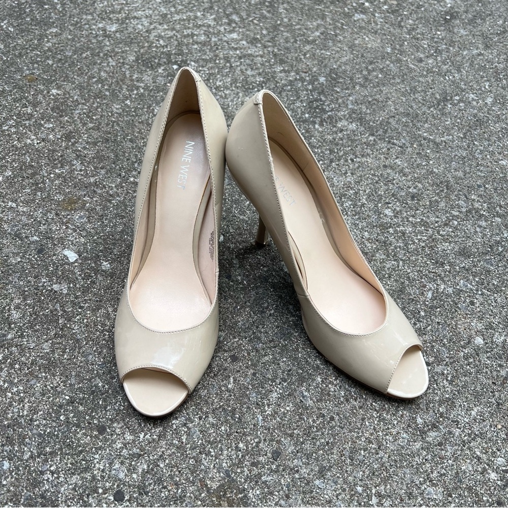 new nine west opened toed nude pumps 
size 10